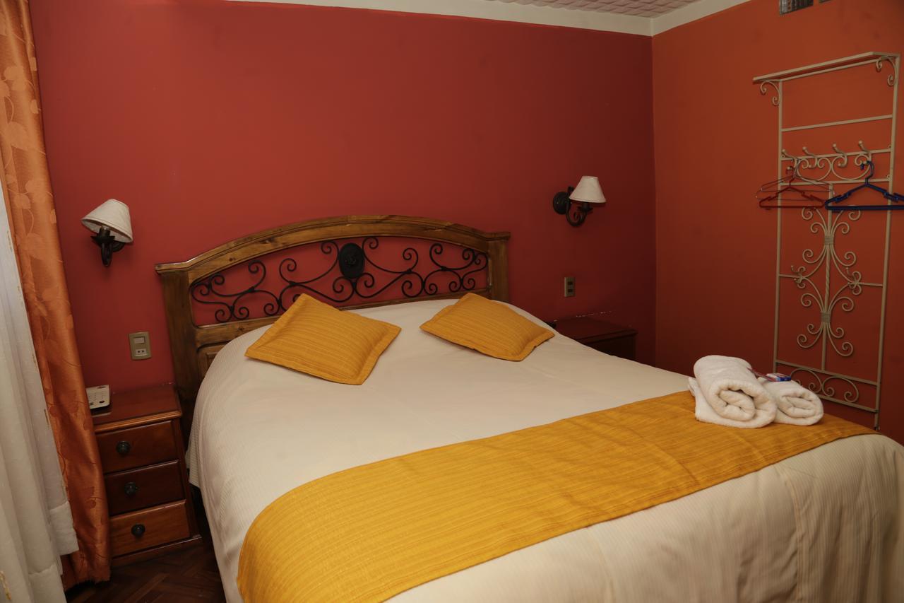Isabela Hotel Suite Ла-Пас Экстерьер фото